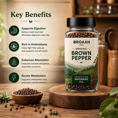 Jar of Orgaan Organic Brown Pepper with key benefits listed on a wooden background